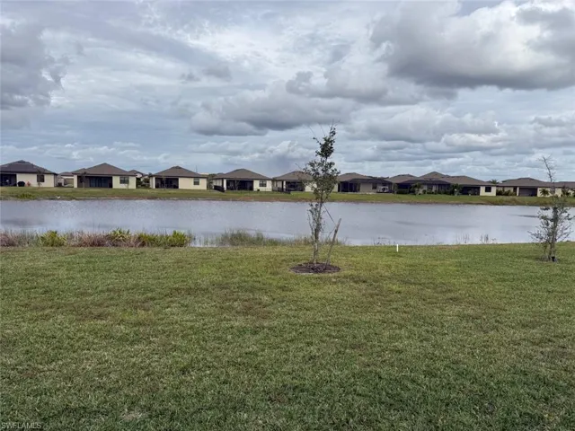 Water view with nearby suburban area