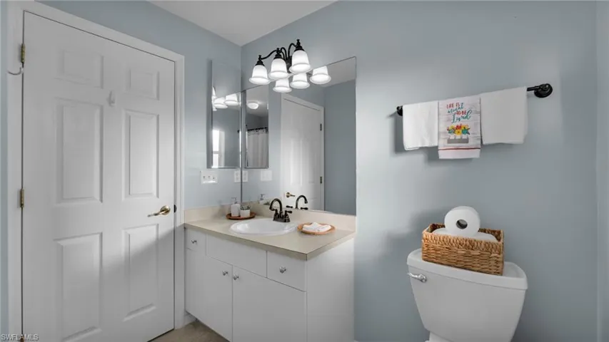 Bathroom with vanity and toilet
