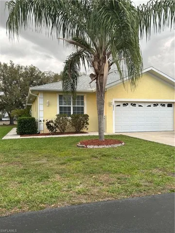 Villa with 2 Car Garage and Driveway Large front and back yard.