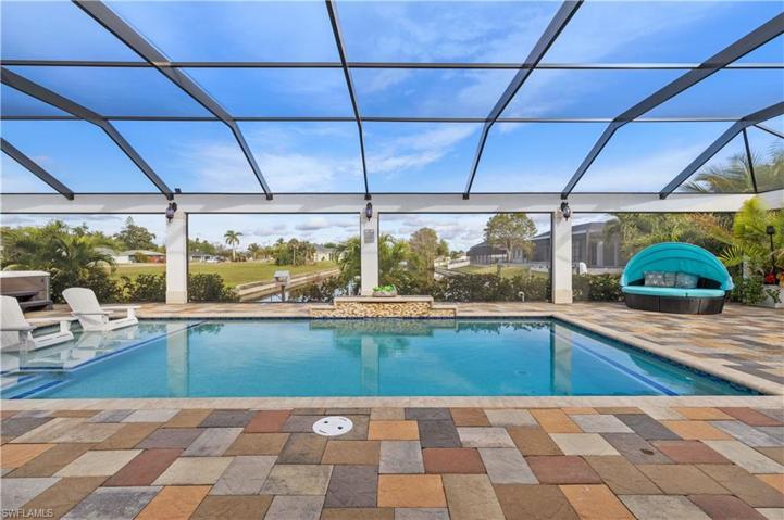 View from sliders of huge pool & canal