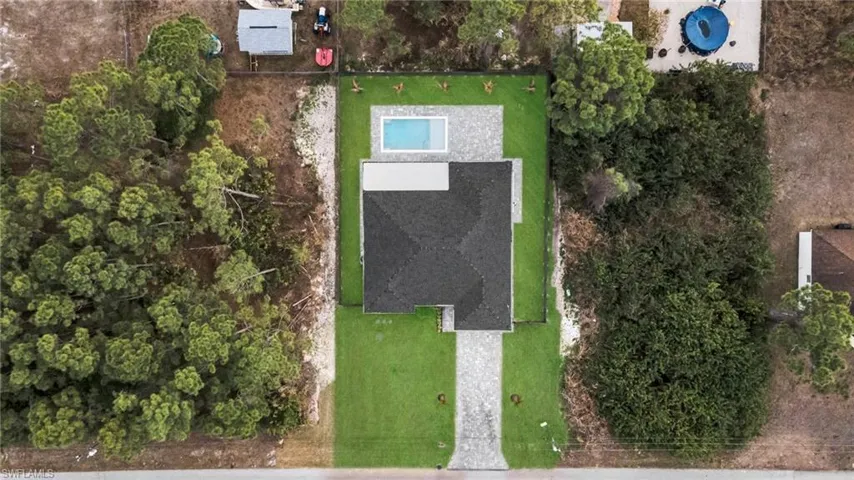 Drone / aerial view of a pool area