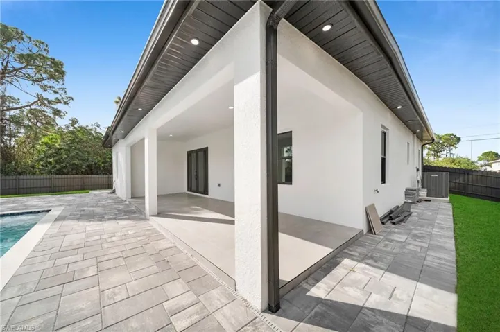 Fenced backyard featuring a patio area