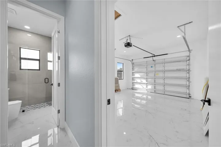 Garage featuring recessed lighting