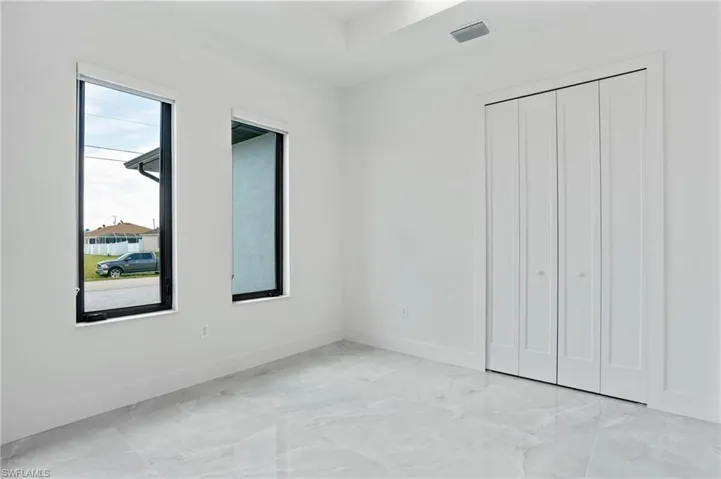 Unfurnished bedroom featuring a closet