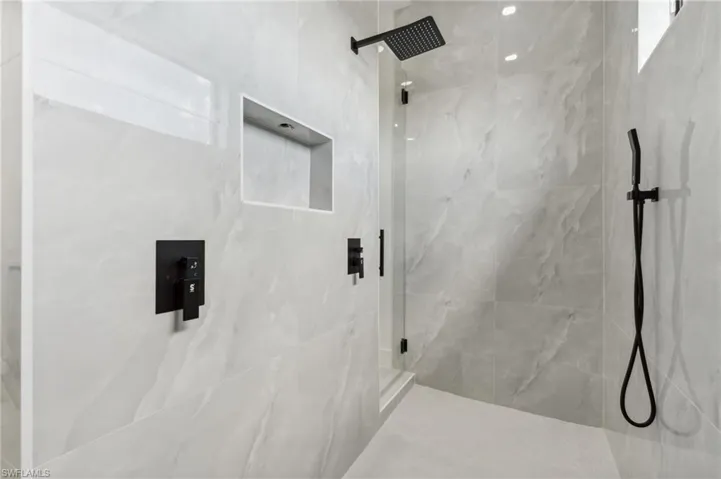 Bathroom with a tile shower