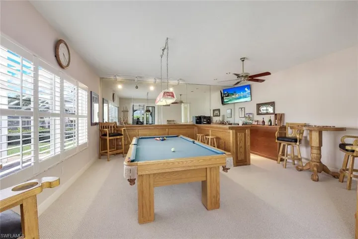 Set up as a Billiard room with wet bar. Amazing space for parties or could be converted into a downstairs Master.