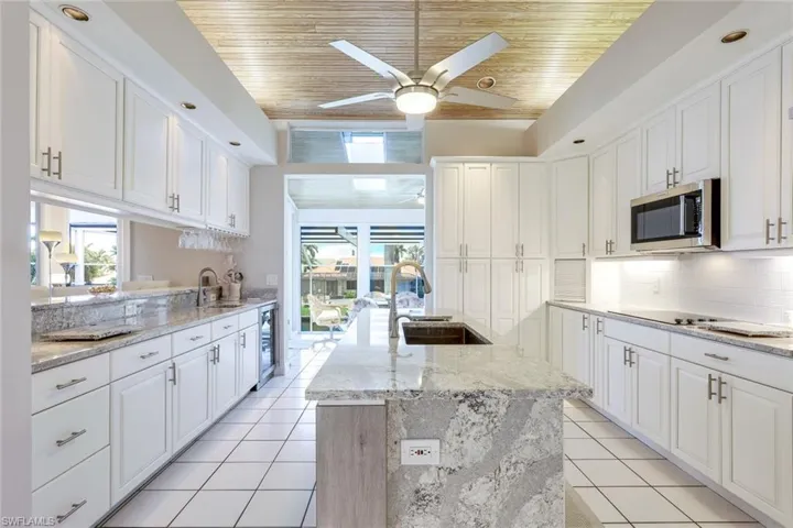 Gourmet kitchen with updated high end appliances.