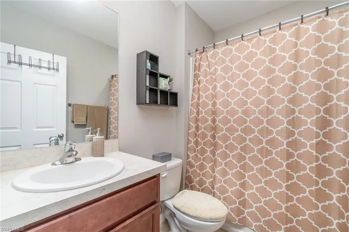 Guest Bathroom with vanity, and Tub/shower