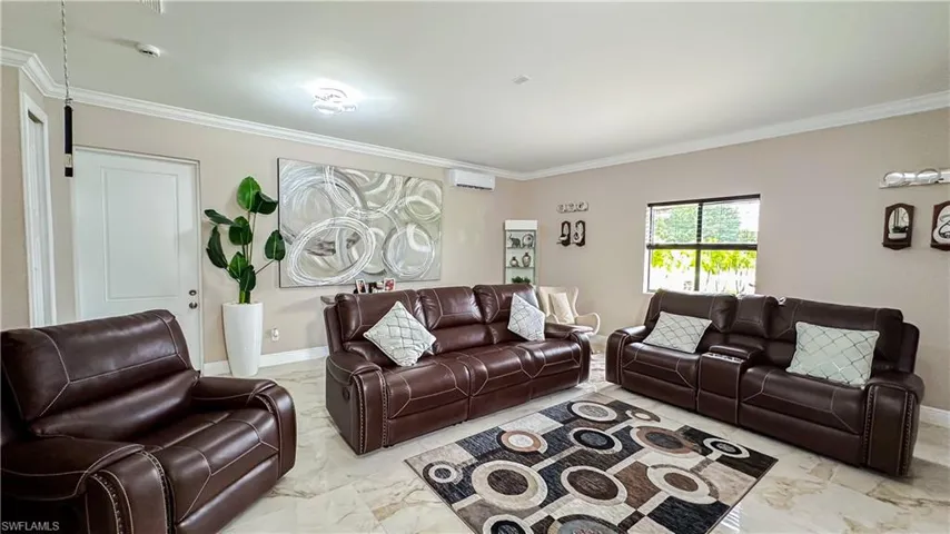 Tiled living room with ornamental molding