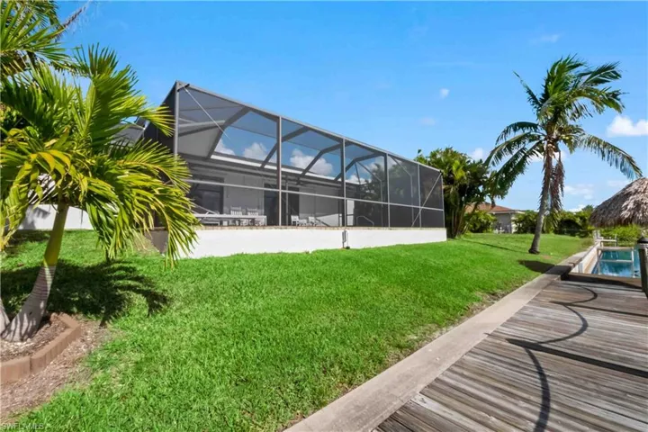 View of yard featuring a lanai