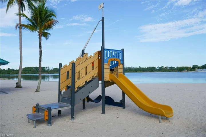 View of playground with a water view