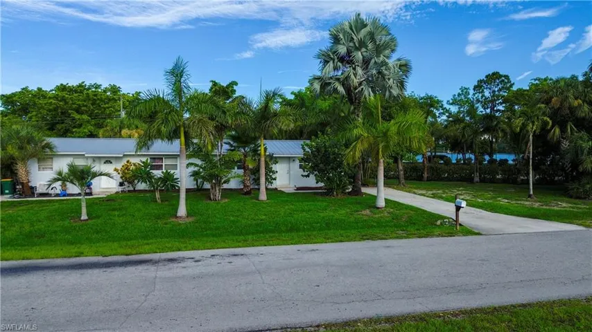 View of front of house featuring a front lawn