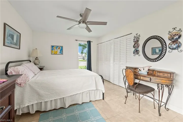 Lots of room in the master bedroom, a remote controlled ceiling fan and ample closet space.