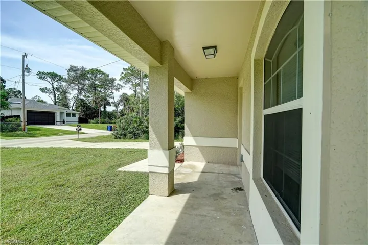 View of patio / terrace with a garage