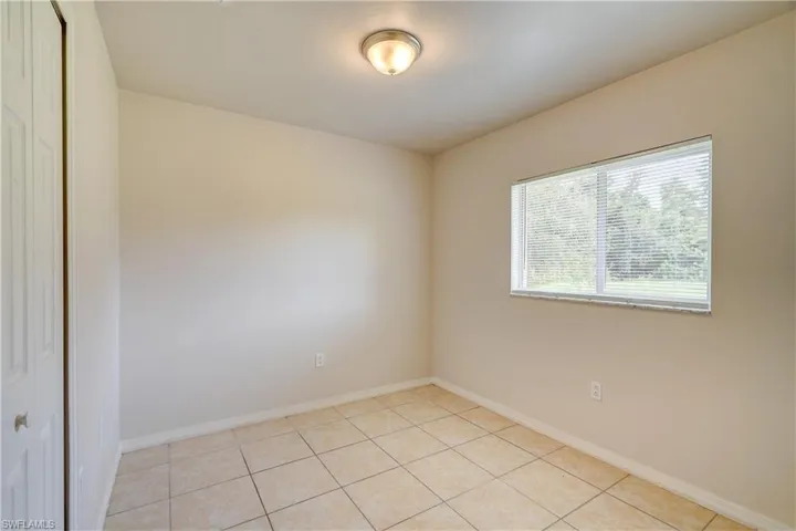 View of tiled empty room
