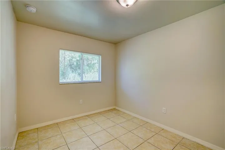 View of tiled empty room