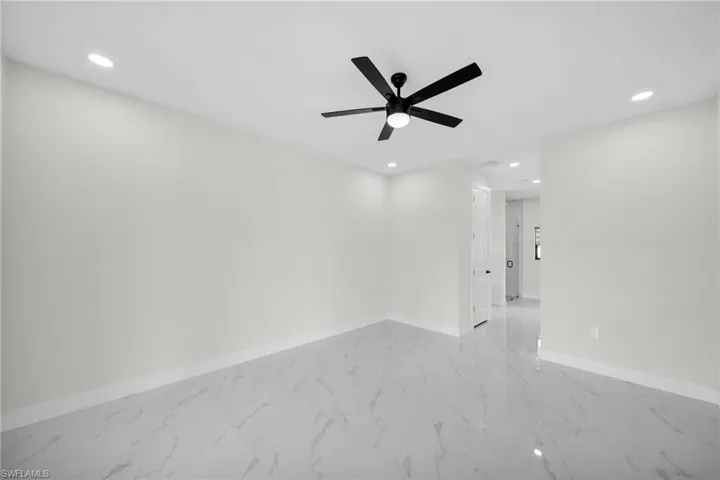 Unfurnished room with ceiling fan