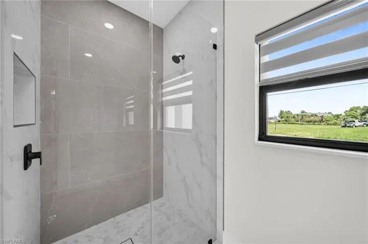Bathroom with a tile shower