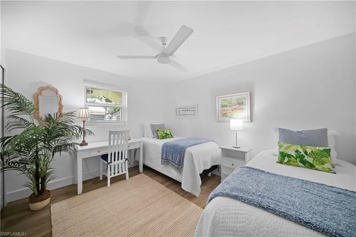 2nd Bedroom featuring wood finished floors and ceiling fan