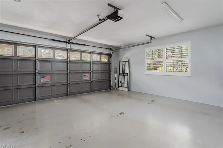 Garage with Refrigerator, Overhead Rack, SUPER QUIET opener. lots of light!