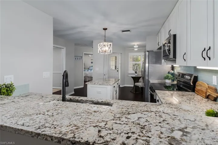 View from Dining area into Kitchen.