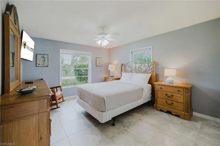 Guest Bedroom with Queen size bed and flatscreen tv