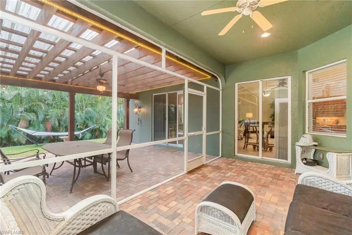 screen lanai looking out at covered patio