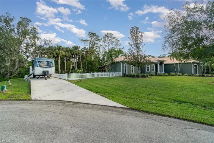 Large 1/2 acre lot with RV parking and fenced yard