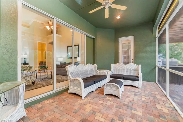 Screen lanai with entry from Sitting room, primary bedroom and family room