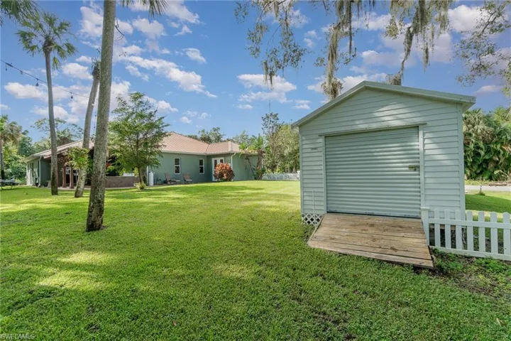View of yard featuring a storage shed