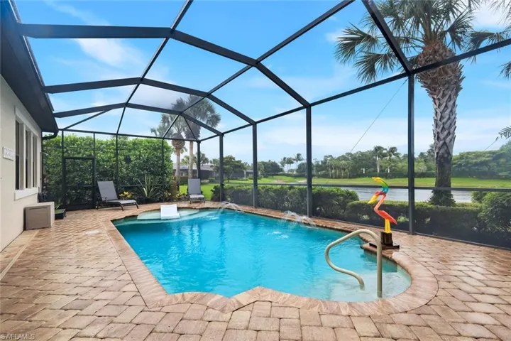 Pool, Brick Pavers, and Cage overlooking Lake