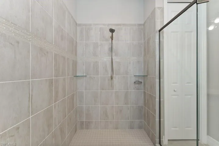 Bathroom with a tile shower
