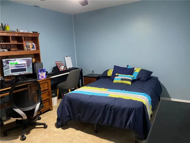 Bedroom featuring tile patterned floors