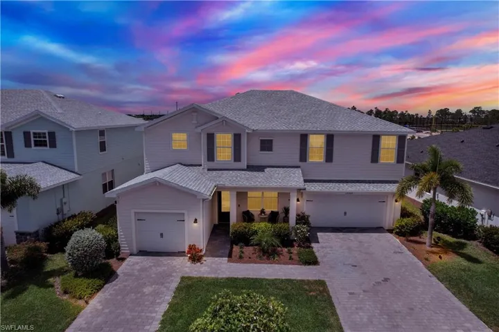 View of front of property with a garage