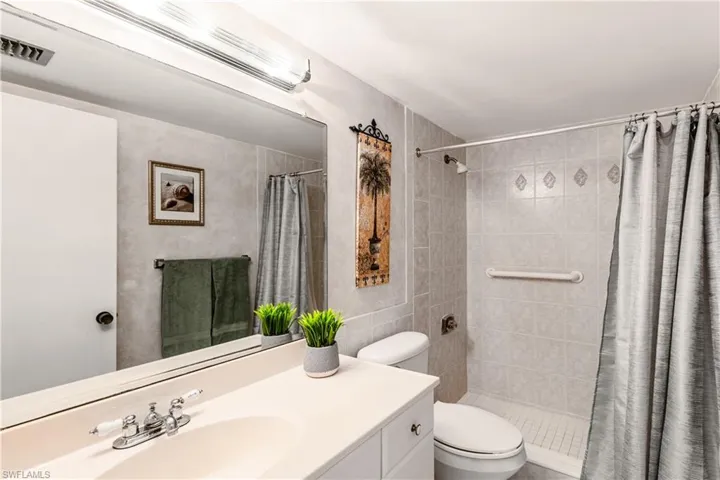 Master Bathroom featuring walk in shower