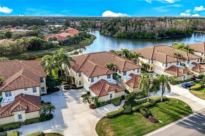 Aerial view of residential area with a nearby body of water
