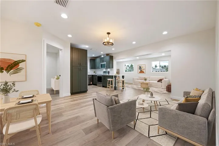 Living room featuring recessed lighting and light wood-style floors