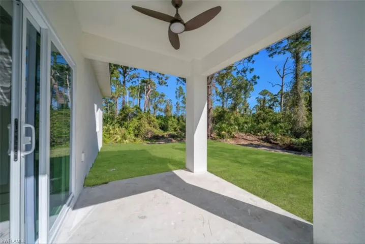 View of patio featuring ceiling fan