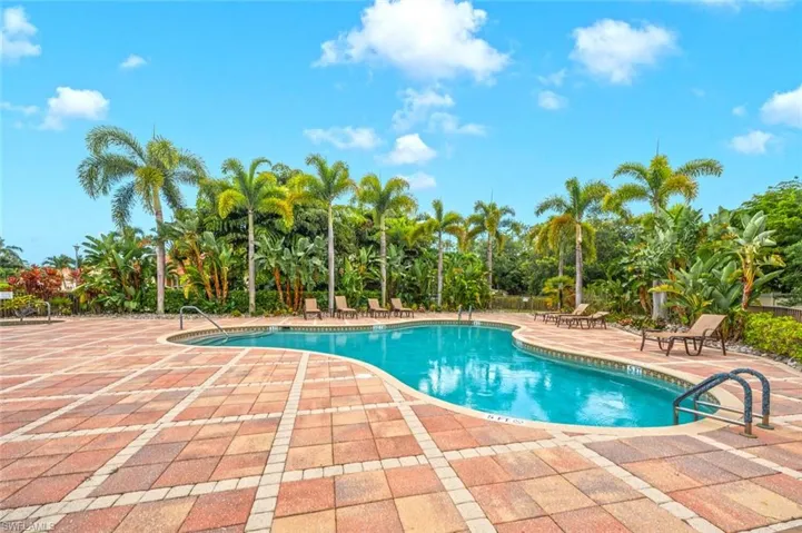 Community pool featuring a patio area