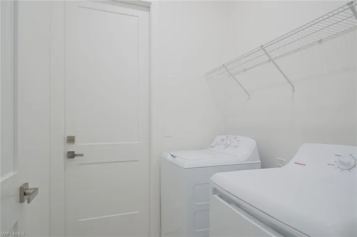 Laundry room featuring washer and dryer