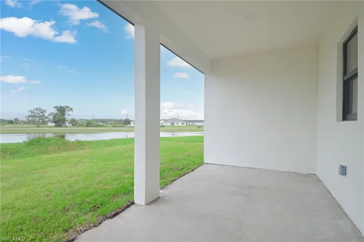 View of terrace featuring a water view
