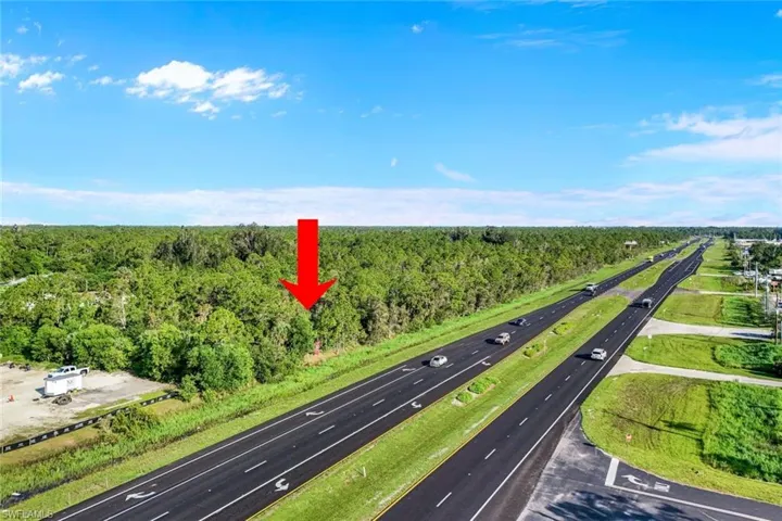 Bird's eye view of a highway and a forest