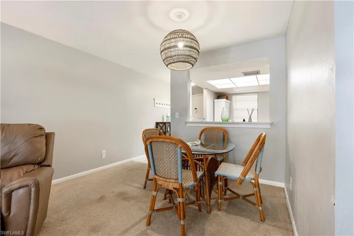 Dining room with light carpet