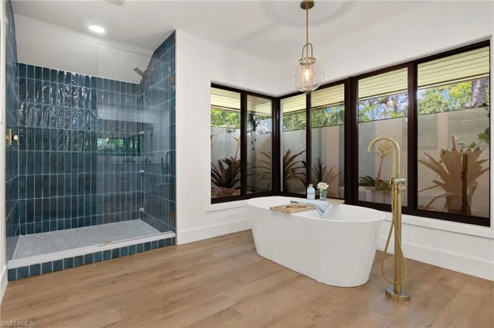 The Master Bathroom has a Private enclosed Patio created a Spa like setting