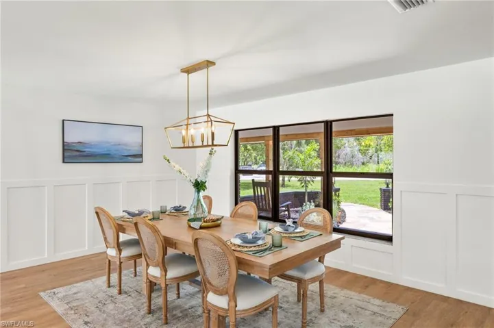 The New Dining Room features Custom Wainscoting Walls