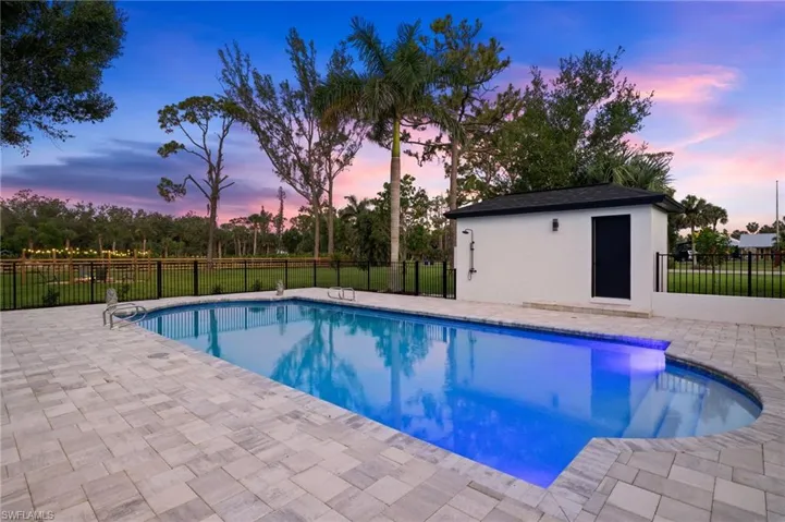 There are 2 Ned LED Color Changing Pool Lights & an Outdoor Pool Bath with an Outdoor Shower