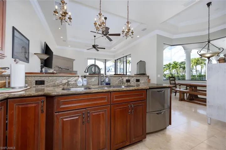Granite countertops, Plenty of Space and cabinets.  Double dishwasher