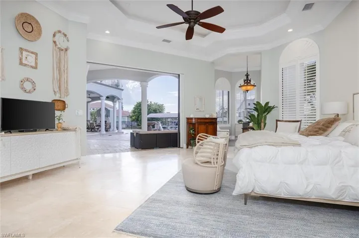Master suite is very large and spacious.   Sliders open to pool area.