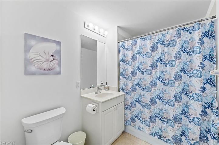 Secondary Bath with comfort height toilet.