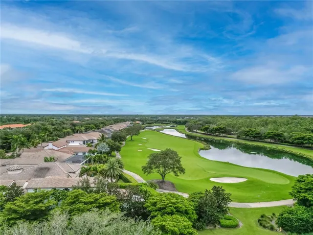 Drone / aerial view of a large body of water and a golf club
